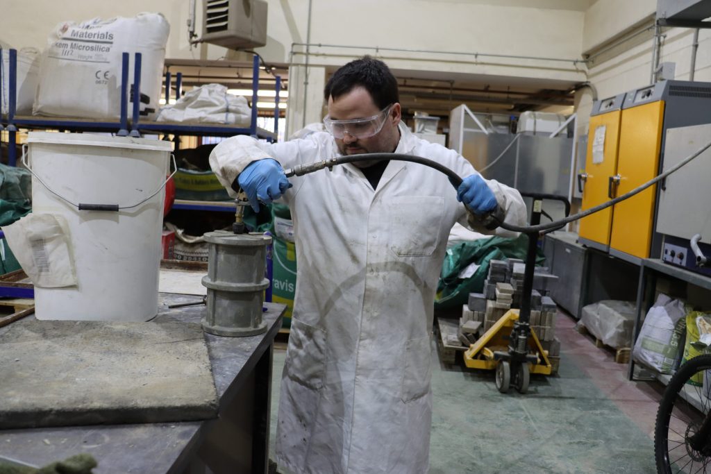 Engage to Change participant working at the Cardiff University concrete factory in the school of engineering