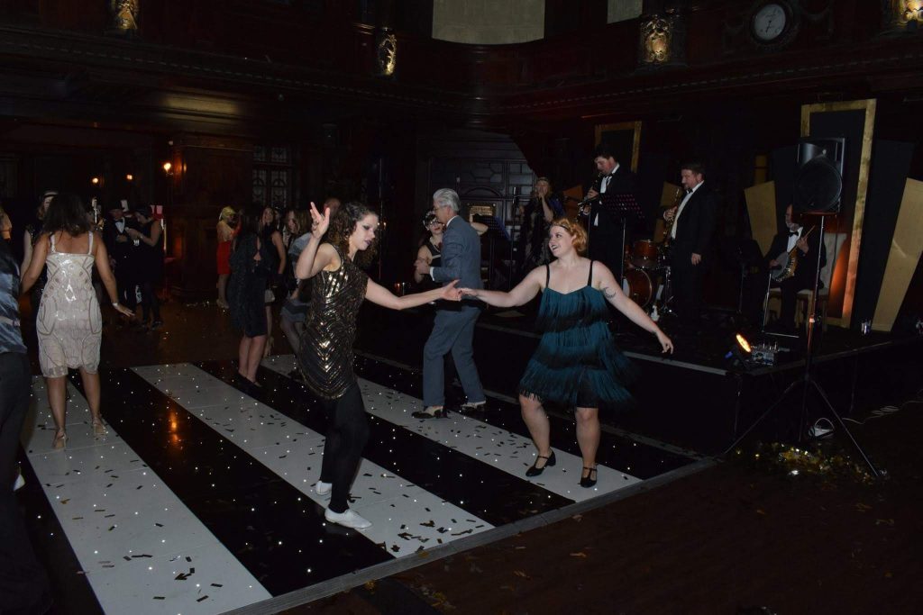 Catrin dancing with in a couple in a jazz-style nightclub