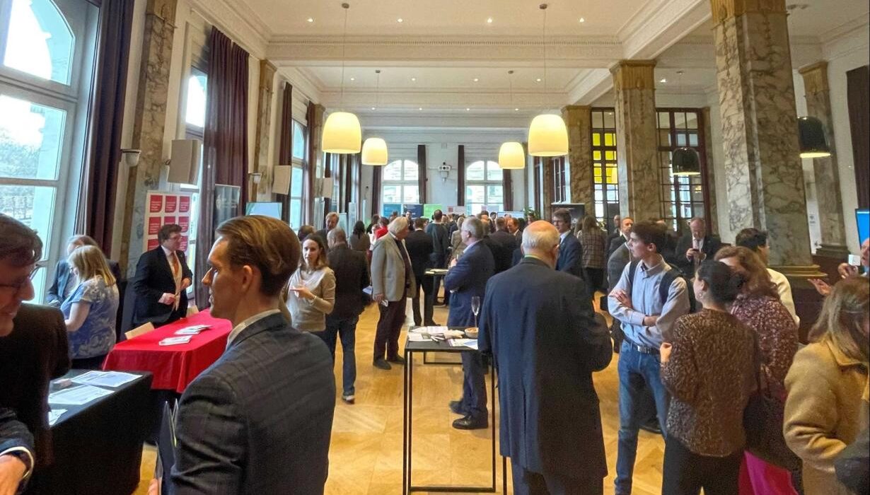 Photo of attendees at the research showcase reception in Brussels