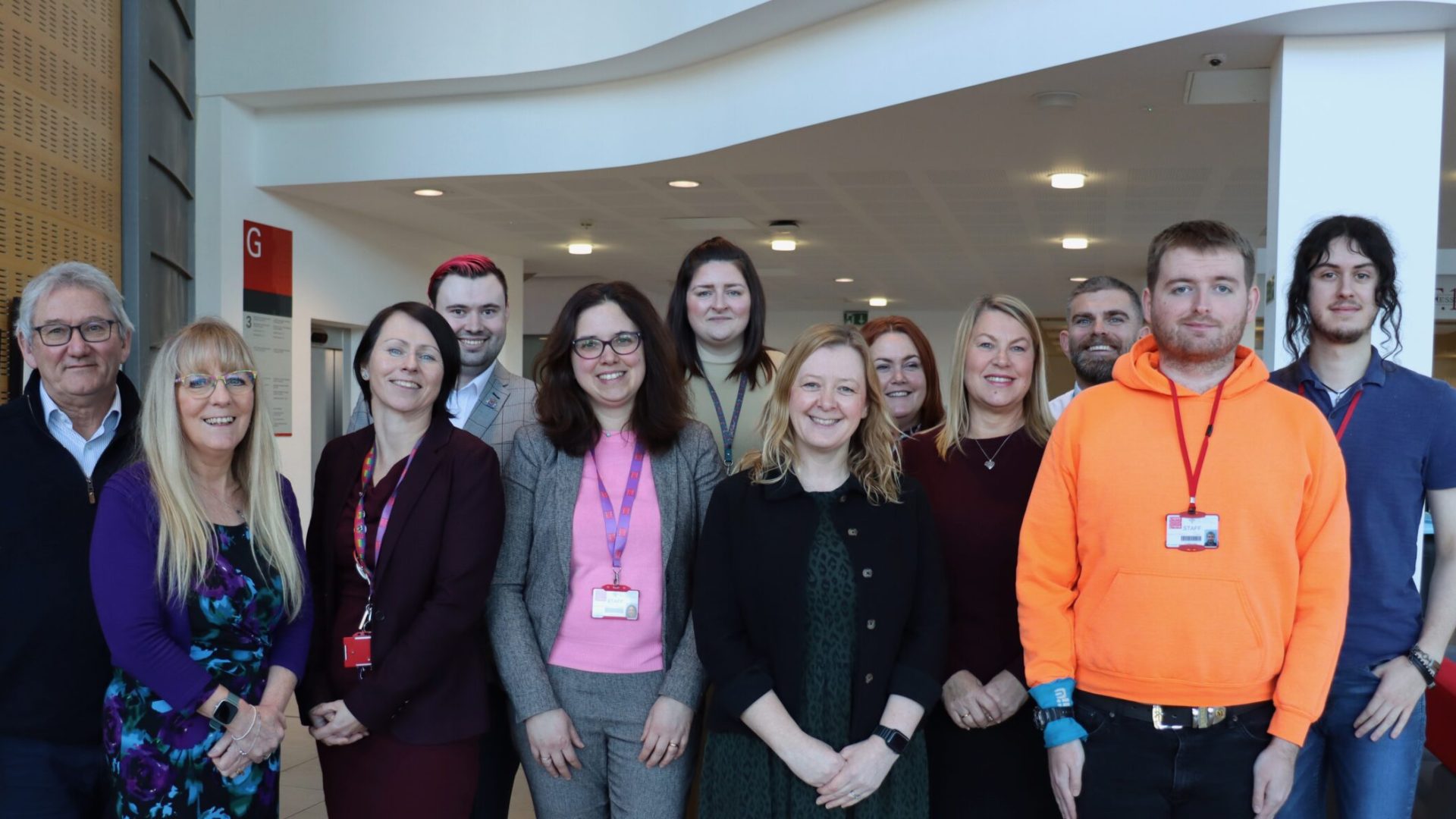 A photo of the Engage to Change team in the Hadyn Ellis Building reception with MS Jayne Bryant