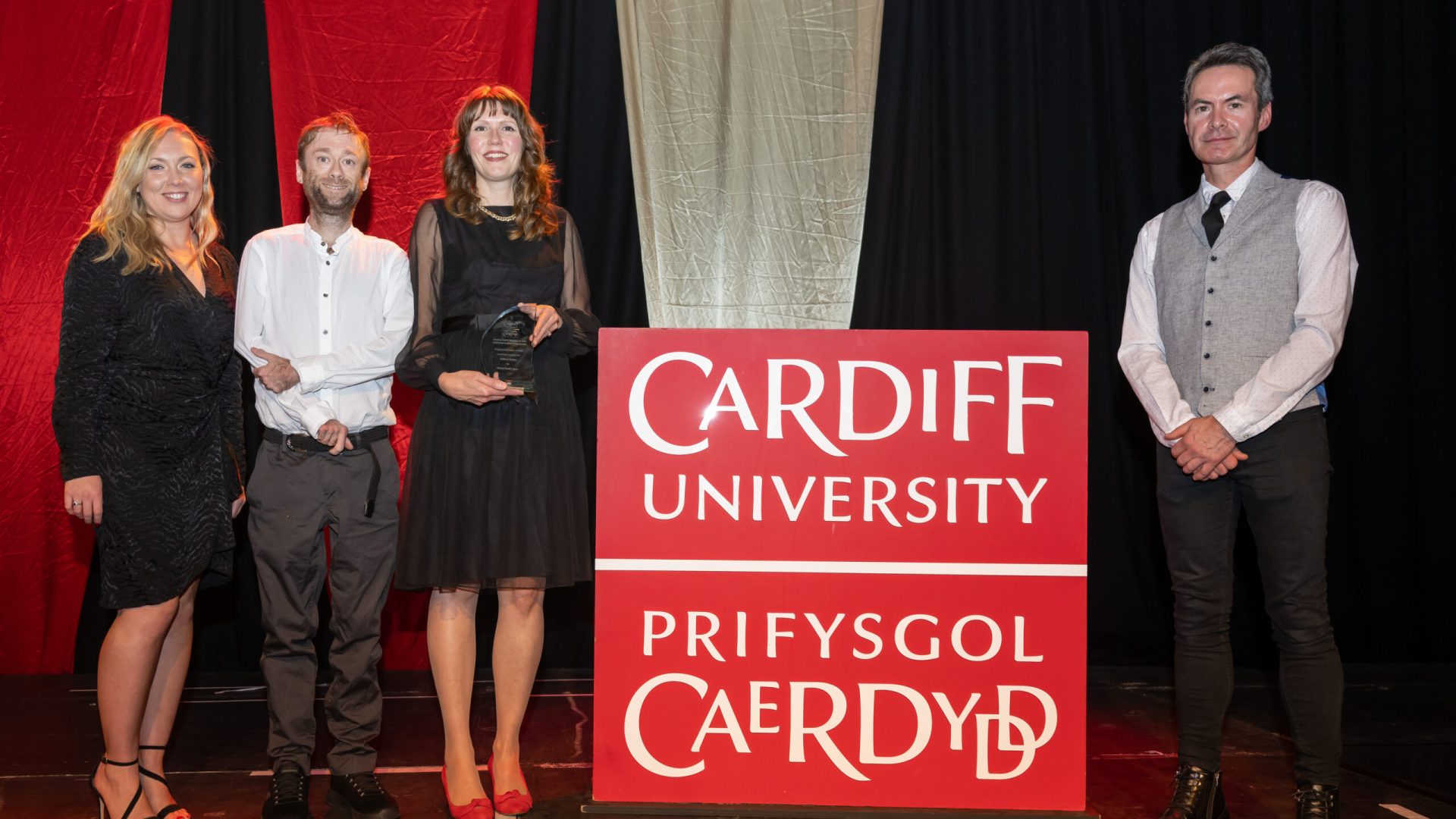 L-R Holly Pearce, Leon Hubbard, and Dr Sarah Rees with VC Professor Damian Walford-Jones at the awards